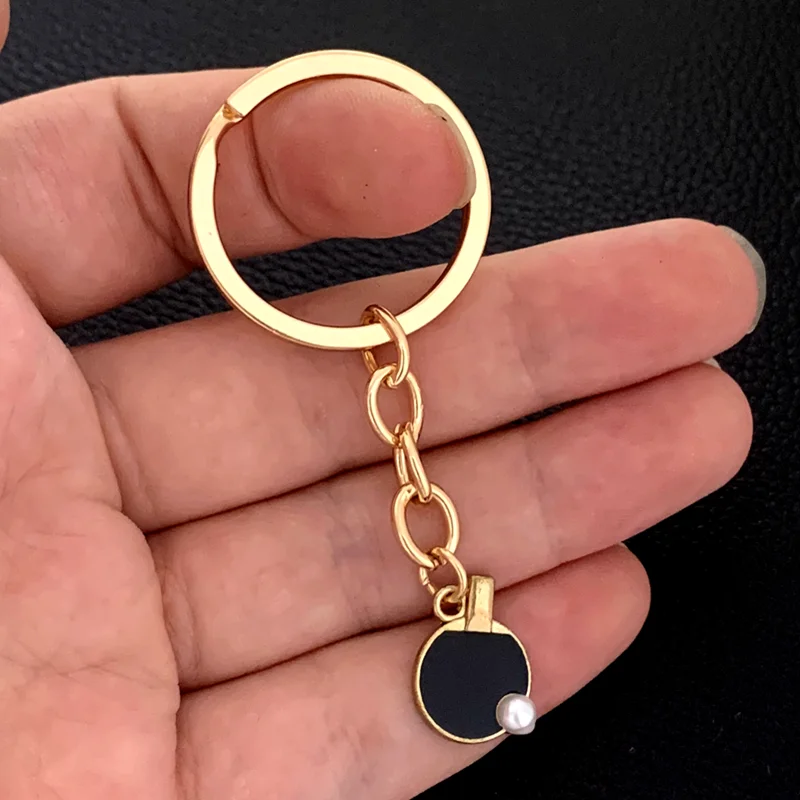 Black Red sports table tennis  - огляд і ціна Table Tennis Keychain